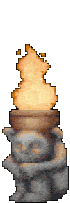 a statue with a lit fire