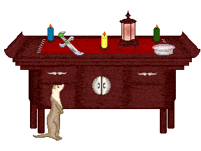 a table with trinkets and candles